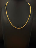 14K yellow gold rope chain measuring 18 inches long and 2.75mm wide, weighing 13.5 grams, displayed on a black jewelry bust.