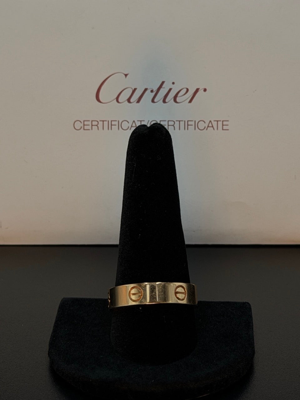 Authentic Cartier Love Ring crafted in solid 18K Rose Gold. Size 11, weighs 7.3 grams, includes Cartier Certificate. Acima Financing Available.